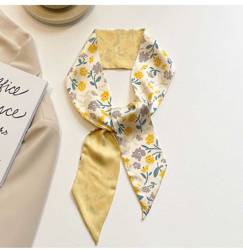 yellow scarf folded on a table