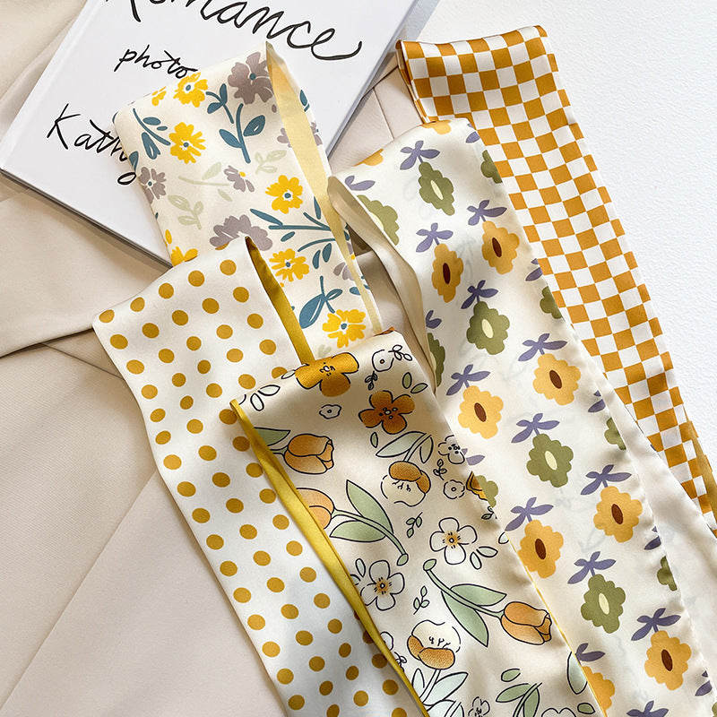model wearing yellow floral scarf in spring