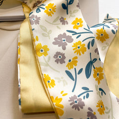 yellow scarf styled as a hairband
