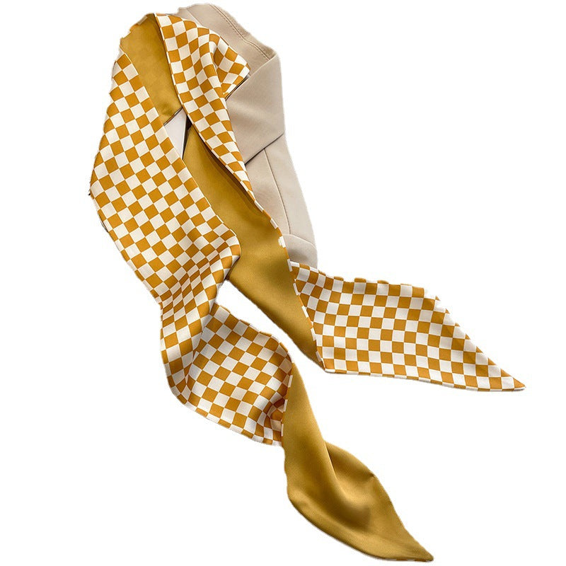 yellow scarf styled as a hairband
