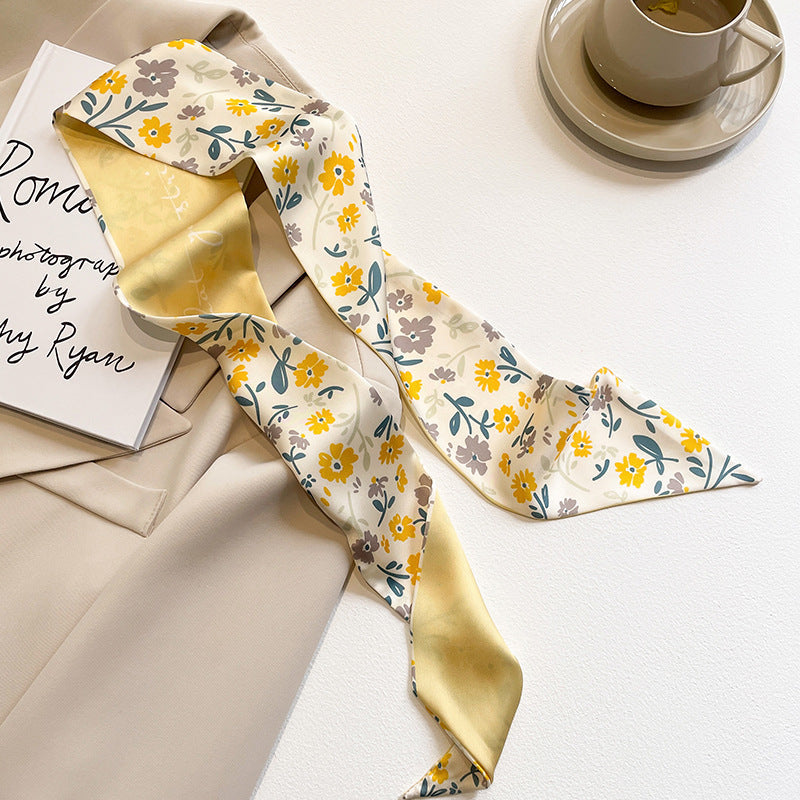 yellow scarf folded on a table