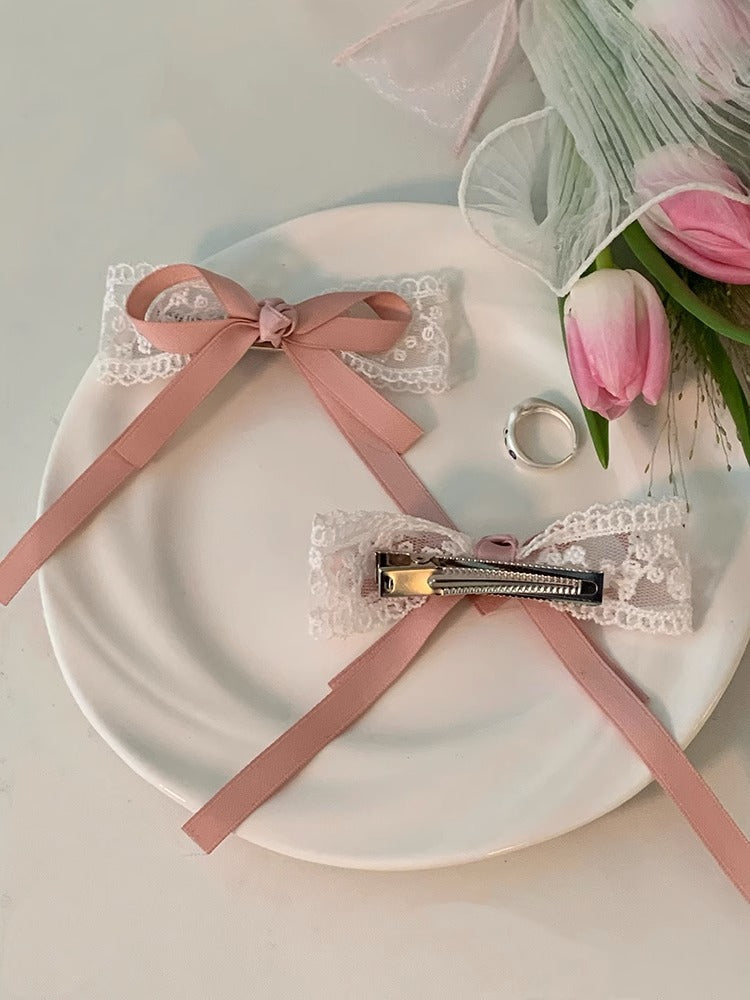 Chic hair clips set against a pastel background