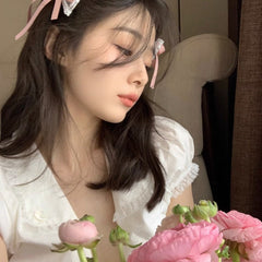 Lace bow hair clips on a mannequin