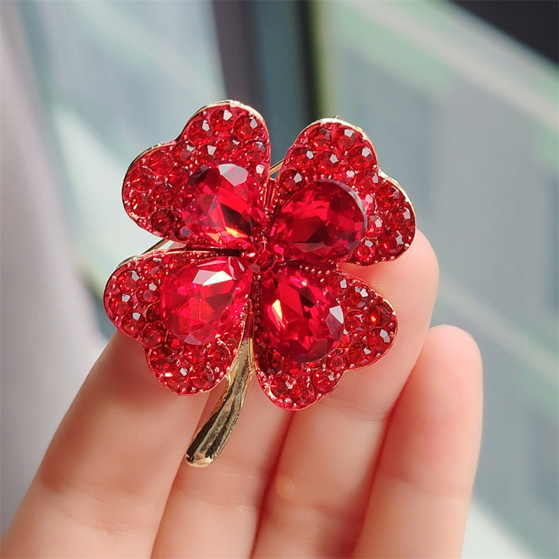 Cat eye gem brooch displayed with outfit