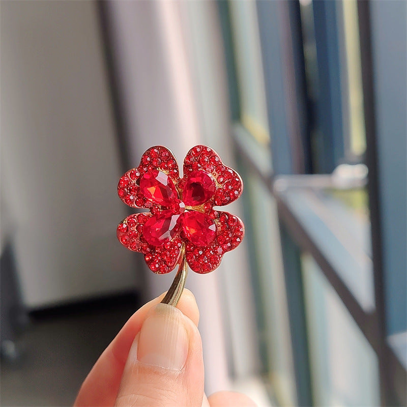 Vibrant colours of clover cat eye brooch