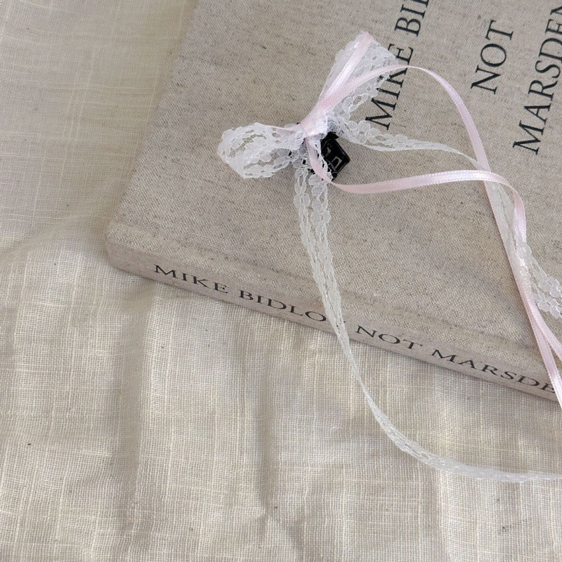 Stylish white bow hair clip for ballet fans