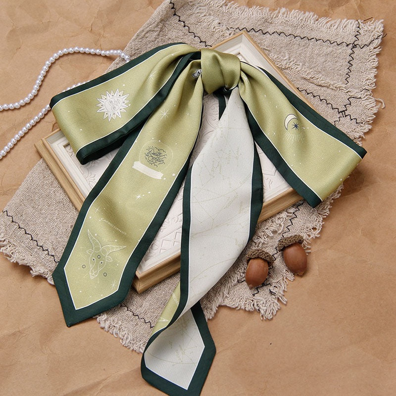 Close-up of zodiac silk scarf details